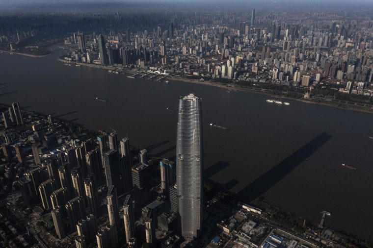 14) Wuhan Greenland Center, Wuhan All taller than anything in the UK, 25) Willis Tower, Chicago, 24) Wuhan Tower, Wuhan, 23) The Exchange 106, Kuala Lumpur, 21) Zifeng Tower, Nanjing, 21) Suzhou IFS, Suzhou, 19 and 20) Petronas Twin Towers, Kuala Lumpur, 18) Changsha IFS Tower 1, Changsha, 17) Vincom Landmark 81, Ho Chi Minh City, 16) Lakhta Center, St. Petersburg, 15) Central Park Tower, New York City, 14) Wuhan Greenland Center, Wuhan, 13) International Commerce Centre, Hong Kong, 12) Shanghai World Financial Center, Shanghai, 11) TAIPEI 101, Taipei, 10) CITIC Tower, Beijing, 8) Tianjin CTF Finance Centre, Tianjin, 8) Guangzhou CTF Finance Centre, Guangzhou, 7) One World Trade Center, New York City, 6) Lotte World Tower, Seoul, 5) Ping An Finance Center, Shenzhen, 4) Makkah Royal Clock Tower, Mecca, 3) Shanghai Tower, Shanghai, 2) Merdeka 118, Kuala Lumpur, 1) Burj Khalifa, Dubai