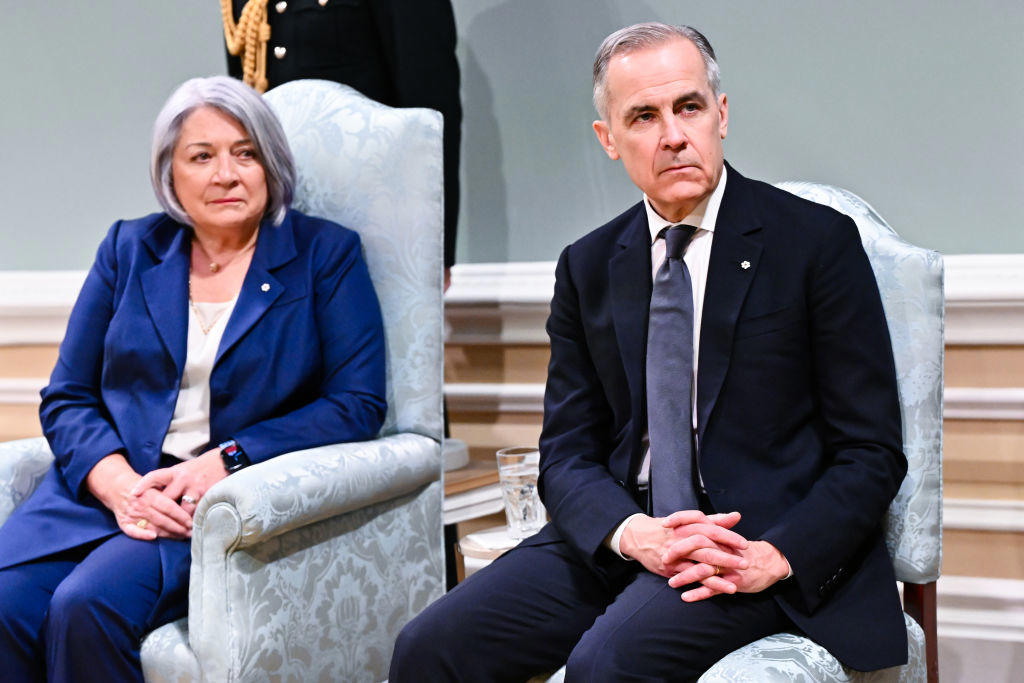 Mark Carney sits beside Governor General Mary Simon at swearing-in Governor General of Canada Mary Simon arrives for cabinet swearing-in ceremony, King Charles III participates in ceremonial tree planting at Rideau Hall, WestJet planes parked at Calgary International Airport apron, Governor General of Canada Mary Simon speaks during meeting with Pope Francis, Mark Carney sits beside Governor General Mary Simon at swearing-in, Pope Francis and Governor General Mary Simon attend meeting in Quebec, Air Canada plane taxis at Calgary International Airport