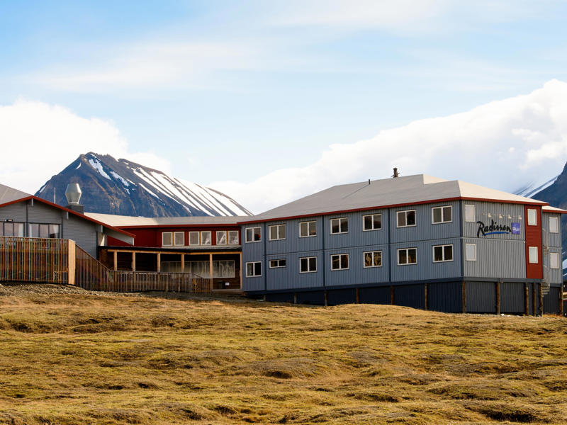 The town is also home to the world's northernmost hotel. Svalbard was founded as a hunting and fishing base., Longyearbyen was established as a mining town., Today, the town attracts tourism and scientific research., The doomsday seed vault is home to over a million different seeds., Polar bears act as extra protectors of the world's seeds., Students in the region don't get an average city education., The town even has a public free university., There are plenty of activities to enjoy in the world's northernmost town., Besides, they can also explore their extreme nature surroundings., The town is a great location for watching lunar events., Others rely on four-legged neighbors for transportation., The town is also home to the world's northernmost hotel.