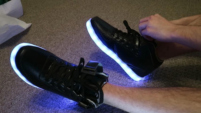 10. Light-Up Sneakers For Grown-Ups 1. Toe Shoes For The Street, 2. Heel-less "Gravity-Defying" Shoes, 3. Velcro Dress Shoes, 4. Flip-Flop Boots, 5. Extreme Square-Toe Dress Shoes, 6. Jelly Sandals For Adults, 7. Stiletto Sneakers, 8. Oversized Clownish Skate Shoes, 9. Inflatable Sneakers With Pumps, 10. Light-Up Sneakers For Grown-Ups, 11. Bowling-Style Shoes, 12. Moon Boots, 13. Hyper-Pointy "Witch" Shoes, 14. Creeper Shoes' Thick Soles, 15. Denim Boots, 16. Sock Sneakers, 17. Disco-Era Gold Platform Boots, 18. Heelys For Adults, 19. Sculptural Heels, 20. Knee-High Converse Sneakers