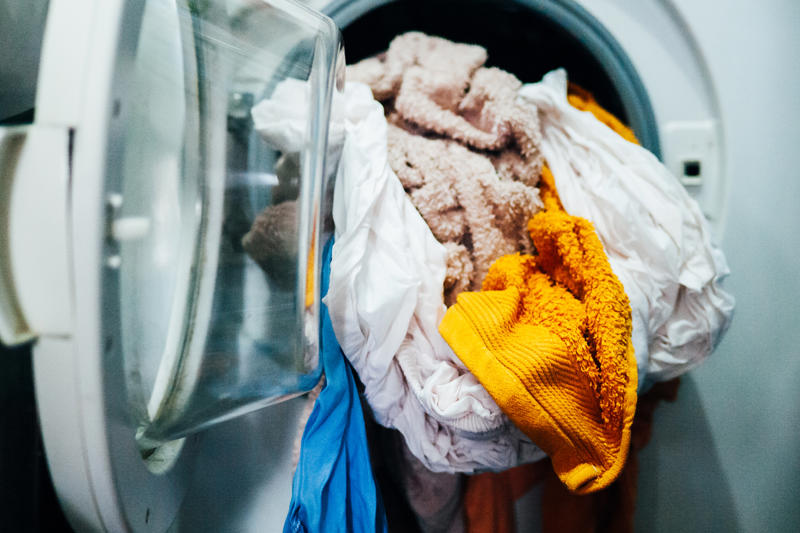 1. Check care labels, 2. Wash second-hand clothes separately, 3. Let it soak, 4. Pop it in the washing machine, 5. Tumble dry or steam iron (if applicable)
