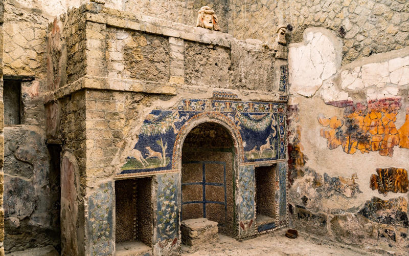 50. Tower of Hercules, Spain, 49. Felix Romuliana, Serbia, 48. Capidava, Romania, 47. Garni Temple, Armenia, 46. The Walls of Lugo, Spain, 45. Temple of Évora, Portugal, 44. The Basilica Cistern, Turkey, 43. Theatre of Philippopolis, Bulgaria, 42. Butrint, Albania, 41. Paphos Archaeological Park, Cyprus, 40. The Antonine Wall, UK, 39. The Temple of Jupiter, Damascus, Syria, 38. The Theatre of Vienne, France, 37. Kom el-Dikka, Egypt, 36. Palmyra, Syria, 35. Ostia Antica, Italy, 34. Arena of Nîmes, France, 33. Arles Amphitheatre, France, 32. Roman Carthage, Tunisia, 31. Antium, Italy, 30. Sabratha, Libya, 29. Djémila, Algeria, 28. Verona Arena, Italy, 27. Amphitheatre of El Jem, Tunisia, 26. Aqueduct of Segovia, Spain, 25. Pula Amphitheatre, Croatia, 24. Villa Adriana, Italy, 23. Tarraco, Spain, 22. Herculaneum, Italy, 21. Jerash, Jordan, 20. Aula Palatina, Germany, 19. Volubilis, Morocco, 18. Theatre of Aspendos, Turkey, 17. Theatre of Bosra, Syria, 16. Temple of Bacchus at Baalbek, Lebanon, 15. Hadrian’s Library and The Odeon of Herodes Atticus, Greece, 14. Caesarea Maritima, Israel, 13. Leptis Magna, Libya, 12. Timgad, Algeria, 11. The Roman Baths, UK, 10. Pont du Gard, France, 9. The Baths of Caracalla/The Circus Maximus, Italy, 8. Augusta Emerita, Spain, 7. The Library of Celsus, Turkey, 6. Theatre of Orange, France, 5. The Pantheon, Italy, 4. The Palace of Diocletian, Croatia, 3. Hadrian’s Wall, UK, 2. The Roman Forum/The Colosseum, Italy, 1. Pompeii, Italy