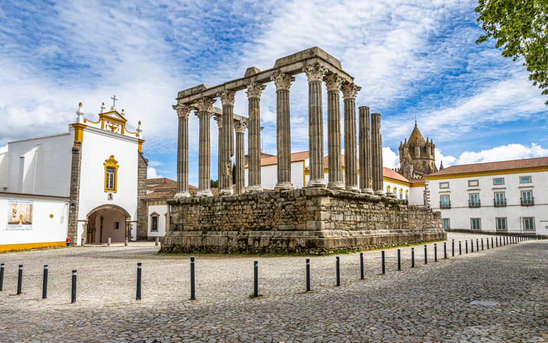 50. Tower of Hercules, Spain, 49. Felix Romuliana, Serbia, 48. Capidava, Romania, 47. Garni Temple, Armenia, 46. The Walls of Lugo, Spain, 45. Temple of Évora, Portugal, 44. The Basilica Cistern, Turkey, 43. Theatre of Philippopolis, Bulgaria, 42. Butrint, Albania, 41. Paphos Archaeological Park, Cyprus, 40. The Antonine Wall, UK, 39. The Temple of Jupiter, Damascus, Syria, 38. The Theatre of Vienne, France, 37. Kom el-Dikka, Egypt, 36. Palmyra, Syria, 35. Ostia Antica, Italy, 34. Arena of Nîmes, France, 33. Arles Amphitheatre, France, 32. Roman Carthage, Tunisia, 31. Antium, Italy, 30. Sabratha, Libya, 29. Djémila, Algeria, 28. Verona Arena, Italy, 27. Amphitheatre of El Jem, Tunisia, 26. Aqueduct of Segovia, Spain, 25. Pula Amphitheatre, Croatia, 24. Villa Adriana, Italy, 23. Tarraco, Spain, 22. Herculaneum, Italy, 21. Jerash, Jordan, 20. Aula Palatina, Germany, 19. Volubilis, Morocco, 18. Theatre of Aspendos, Turkey, 17. Theatre of Bosra, Syria, 16. Temple of Bacchus at Baalbek, Lebanon, 15. Hadrian’s Library and The Odeon of Herodes Atticus, Greece, 14. Caesarea Maritima, Israel, 13. Leptis Magna, Libya, 12. Timgad, Algeria, 11. The Roman Baths, UK, 10. Pont du Gard, France, 9. The Baths of Caracalla/The Circus Maximus, Italy, 8. Augusta Emerita, Spain, 7. The Library of Celsus, Turkey, 6. Theatre of Orange, France, 5. The Pantheon, Italy, 4. The Palace of Diocletian, Croatia, 3. Hadrian’s Wall, UK, 2. The Roman Forum/The Colosseum, Italy, 1. Pompeii, Italy