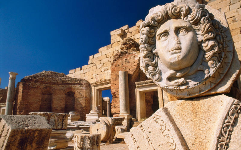 50. Tower of Hercules, Spain, 49. Felix Romuliana, Serbia, 48. Capidava, Romania, 47. Garni Temple, Armenia, 46. The Walls of Lugo, Spain, 45. Temple of Évora, Portugal, 44. The Basilica Cistern, Turkey, 43. Theatre of Philippopolis, Bulgaria, 42. Butrint, Albania, 41. Paphos Archaeological Park, Cyprus, 40. The Antonine Wall, UK, 39. The Temple of Jupiter, Damascus, Syria, 38. The Theatre of Vienne, France, 37. Kom el-Dikka, Egypt, 36. Palmyra, Syria, 35. Ostia Antica, Italy, 34. Arena of Nîmes, France, 33. Arles Amphitheatre, France, 32. Roman Carthage, Tunisia, 31. Antium, Italy, 30. Sabratha, Libya, 29. Djémila, Algeria, 28. Verona Arena, Italy, 27. Amphitheatre of El Jem, Tunisia, 26. Aqueduct of Segovia, Spain, 25. Pula Amphitheatre, Croatia, 24. Villa Adriana, Italy, 23. Tarraco, Spain, 22. Herculaneum, Italy, 21. Jerash, Jordan, 20. Aula Palatina, Germany, 19. Volubilis, Morocco, 18. Theatre of Aspendos, Turkey, 17. Theatre of Bosra, Syria, 16. Temple of Bacchus at Baalbek, Lebanon, 15. Hadrian’s Library and The Odeon of Herodes Atticus, Greece, 14. Caesarea Maritima, Israel, 13. Leptis Magna, Libya, 12. Timgad, Algeria, 11. The Roman Baths, UK, 10. Pont du Gard, France, 9. The Baths of Caracalla/The Circus Maximus, Italy, 8. Augusta Emerita, Spain, 7. The Library of Celsus, Turkey, 6. Theatre of Orange, France, 5. The Pantheon, Italy, 4. The Palace of Diocletian, Croatia, 3. Hadrian’s Wall, UK, 2. The Roman Forum/The Colosseum, Italy, 1. Pompeii, Italy