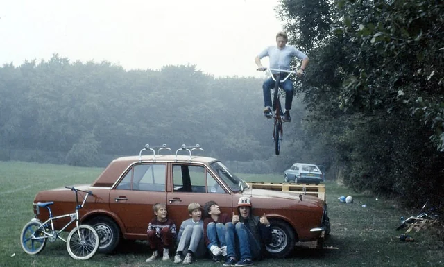UK, 1984 NYC, 1982, Guy with style, On the move, 1981, UK, 1984, Pub night, 1985, Driveway cool, 1988, Summer vibes, 1986, Car show, 1983, Basement party, 1987, Mustang in the 80s, Sweetheart in the car, Sidewalk rollers, Short shorts and cool cars, Squad goals, Colt confidence, Time Square, Fueling the dream, Rebel crew