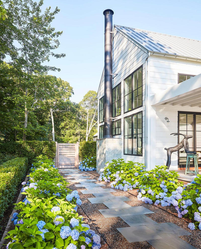 Plot Beautiful Pathways, Incorporate Lighting, Plant a Low-Maintenance, Sustainable Garden, Develop Outdoor Living Spaces, Make Difficult Terrain Usable, Keep Up with Maintenance