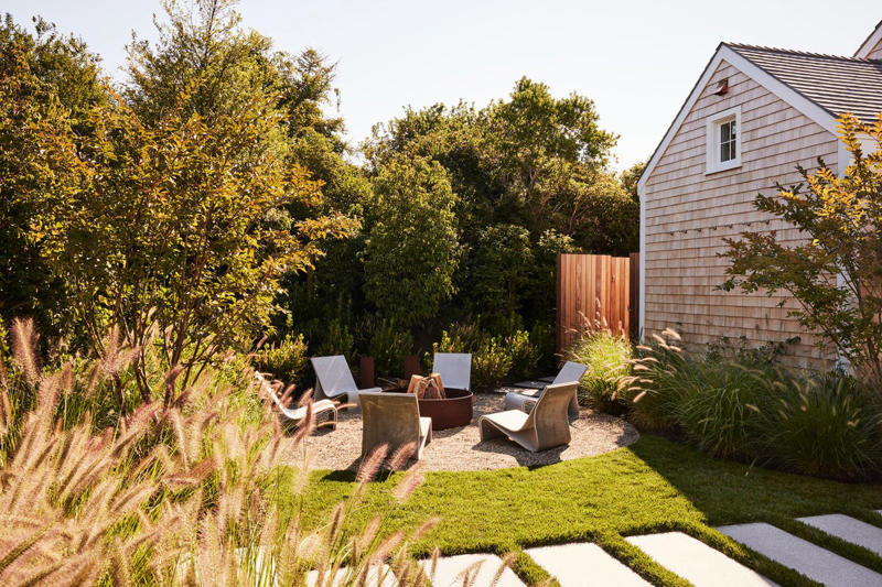 Plot Beautiful Pathways, Incorporate Lighting, Plant a Low-Maintenance, Sustainable Garden, Develop Outdoor Living Spaces, Make Difficult Terrain Usable, Keep Up with Maintenance