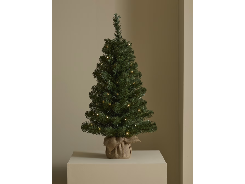 The best artificial Christmas trees for 2025 are: , How I tested, Balsam Hill Vermont white spruce, M&amp;S pre lit spruce Christmas tree, 3ft, Very Home sherwood real look full Christmas tree, Balsam Hill red spruce tree , Next white snowy Nordmann fir 6ft pre-lit Christmas tree , Cox &amp; Cox indoor outdoor fabulously full fir tree, potted, John Lewis pre-lit tree in zinc bucket, 3ft, Balsam Hill Nordmann fir flip tree, Habitat snowy beige Christmas tree, Next black lit twig Christmas tree, 3ft, Your questions on artificial Christmas trees answered, What is the best artificial Christmas tree?, How I selected the best artificial Christmas trees, How to choose the right size Christmas tree for your space, What materials/branch designs offer the most realistic finish?, What maintenance does an artificial tree require?