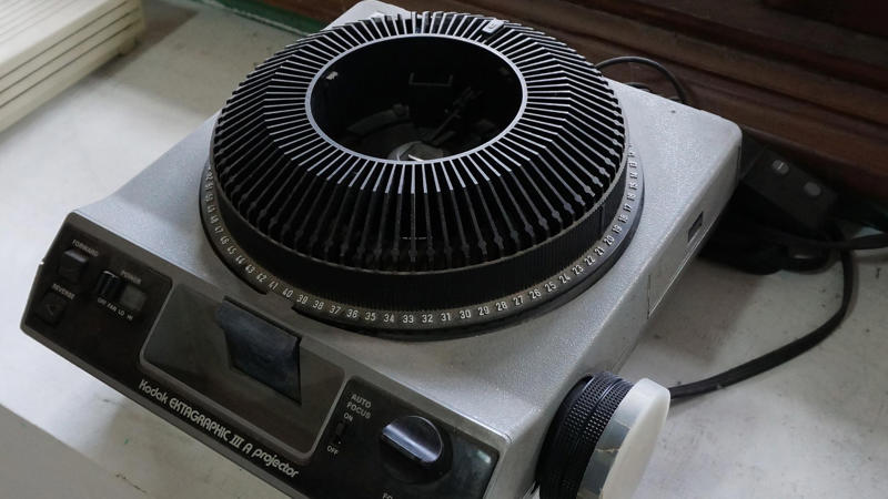Kodak Ektagraphic III Slide Projector Value Beyond The Price Tag, Kodak Carousel 4200 Slide Projector, Vivitar 3000AF Slide Projector, Leitz Pradovit 250 Slide Projector (Leica), Bell & Howell TDC Headliner Model 303, Kodak Ektagraphic III Slide Projector, Sawyer’s Rotomatic 700, Polaroid 35mm Slide Projector, Minolta Mini-35 Slide Projector, GAF 35mm Slide Projector (Model 1680), Kodak Cavalcade 510 Slide Projector, Airequipt Slide Projector, Elmo Slide Projector, Hanimex Slide Projector (Various Models), Kindermann Slide Projector, Gnome Slide Projector, Argus Slide Projector, Kodak Ektapro Ektagraphic Slide Projector, Vivitar Slide Projector 1980s Model, Leica Projector (Early Models), Bell And Howell Slide Projector 1950s–60s Models, Bauer Slide Projector (Vintage), Keystone Slide Projector, Bausch & Lomb Slide Projector