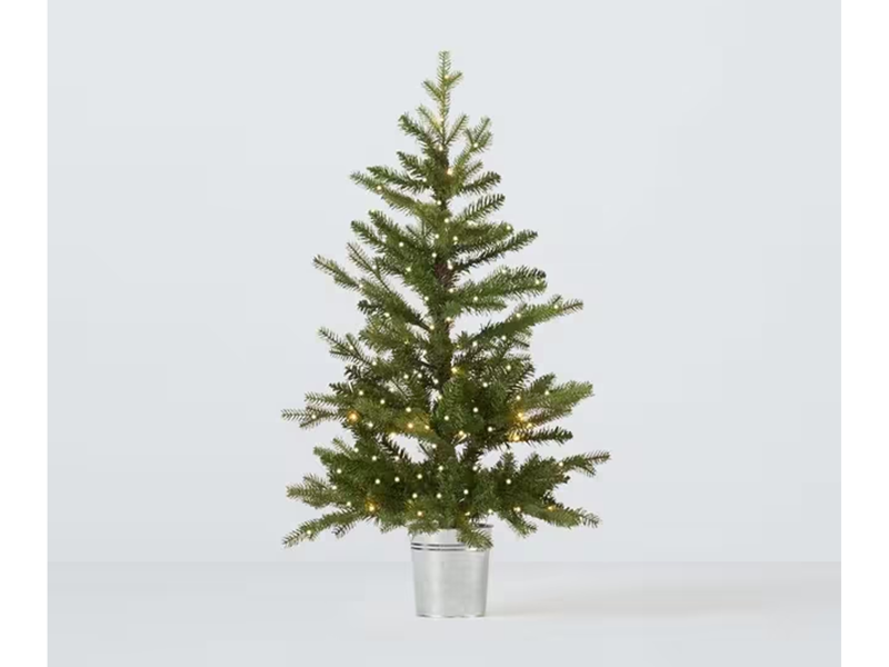 The best artificial Christmas trees for 2025 are: , How I tested, Balsam Hill Vermont white spruce, M&amp;S pre lit spruce Christmas tree, 3ft, Very Home sherwood real look full Christmas tree, Balsam Hill red spruce tree , Next white snowy Nordmann fir 6ft pre-lit Christmas tree , Cox &amp; Cox indoor outdoor fabulously full fir tree, potted, John Lewis pre-lit tree in zinc bucket, 3ft, Balsam Hill Nordmann fir flip tree, Habitat snowy beige Christmas tree, Next black lit twig Christmas tree, 3ft, Your questions on artificial Christmas trees answered, What is the best artificial Christmas tree?, How I selected the best artificial Christmas trees, How to choose the right size Christmas tree for your space, What materials/branch designs offer the most realistic finish?, What maintenance does an artificial tree require?