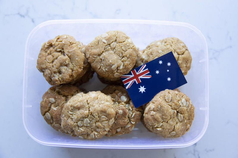 A unique country with unique food A unique country with unique food, Emu anyone?, Witchetty Grubs, High in protein and an authentic food of the land, Macadamia nuts, A nut native to Australia, Damper is a traditional dish still enjoyed today, Balmain bugs, John Dory & chips, A dessert for a ballerina, Fairy Bread, Chiko Roll, Care for a crocodile leg?, Vegemite on toast, Cherry Ripe Bar, Tim Tams, ANZAC biscuits, Cheese and bacon roll, Grilled kangaroo, Barramundi