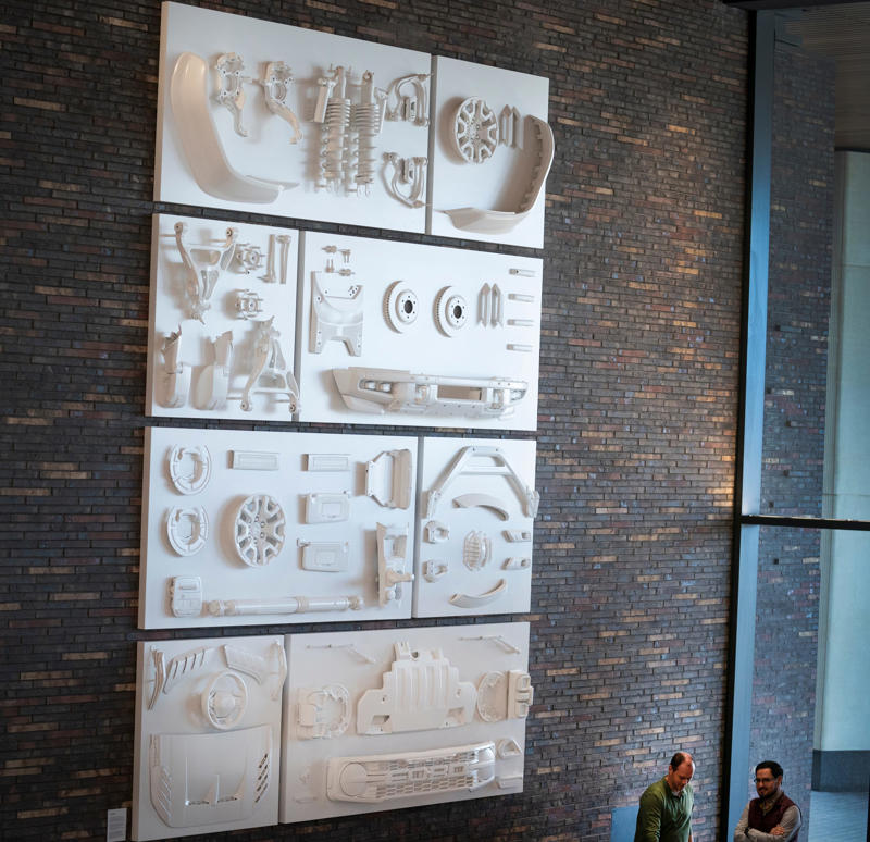 A building built Ford Tough , Aesthetics and art, The cornerstone to a new campus, Welcome area work spots, A courtyard like no other for the Four Vagabonds, Let's eat!, A dream 'hobby shop', The showroom that sells the car