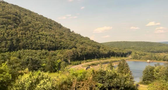 1. There are no security lines or airport hassles, 2. I don't have to worry about size restrictions or checking too many bags, 3. There aren't assigned seats, and I usually have a row to myself, 4. It's a beautiful train ride