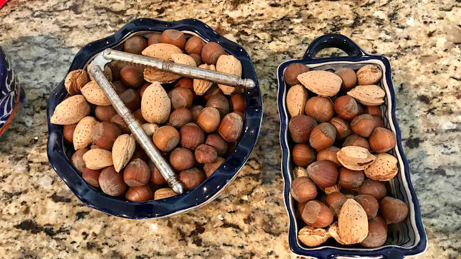 "Simulate the sparkle of newly fallen snow.", "If you are entertaining 10 or more guests you had better have punch.", "Guests can help themselves from [a] party nut tree.", Have an "exciting, spectacular feature" on the holiday table., Set the stage, then "in comes Santa."
