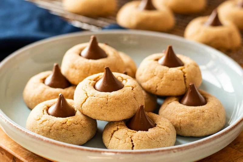 Thumbprint Cookies, Walnut Snowball Cookies, Giant Ginger Cookies, Peanut Butter Blossom Cookies, 3-Ingredient Macaroons, Almond Crescent Cookies, Red Velvet Cookies, Date Skillet Cookie, Pecan Tassies (Pecan Pie Cookies), Potato Chip Cookies, Oatmeal Lace Cookies, Turtle Cookie Cups, Marzipan Shortbread Cookies, White Chocolate Macadamia Nut Cookies, Brown Sugar Snickerdoodle Cookies, Butter Pecan Cookies