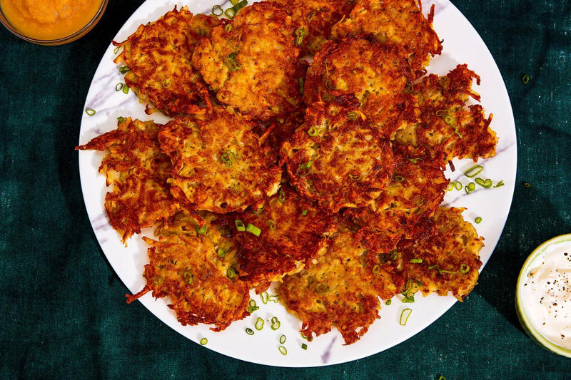Best-Ever Potato Latkes, Potato Pancakes, Scallion Potato Pancakes, Latke Breakfast Hash, Savory Latke Babka, Killer Potato Latkes, Kate's Supercrispy Potato Latkes, Potato Pancakes with Smoked Salmon, Caviar, and Dill Cream, Scallops with Potato Pancakes and Caviar Sauce, Celery Root–Potato Pancakes with Green Apple Sour Cream, Crispy Summer Squash Pancakes