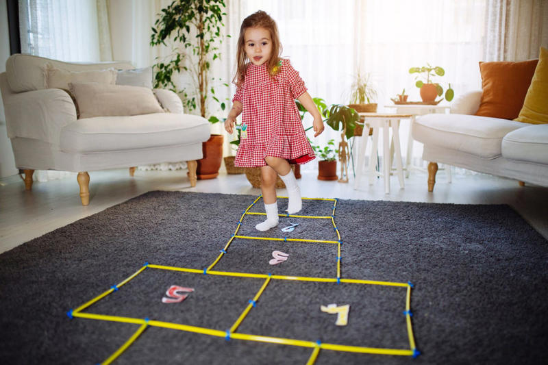 21) Bring hopscotch indoors 1) Build a blanket fort, 2) Play hide and seek, 5) Film a movie, 6) Picnic in the living room, 8) Make jewelry, 12) Write Thank You notes, 15) Sing out out loud, 18) Hold an experiment, 21) Bring hopscotch indoors, 22) Create a Cardboard Castle