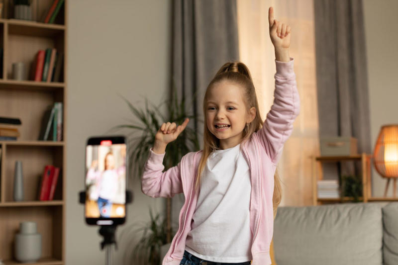 5) Film a movie 1) Build a blanket fort, 2) Play hide and seek, 5) Film a movie, 6) Picnic in the living room, 8) Make jewelry, 12) Write Thank You notes, 15) Sing out out loud, 18) Hold an experiment, 21) Bring hopscotch indoors, 22) Create a Cardboard Castle