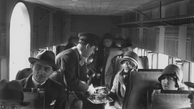 Air Union served the world's first full-course in-flight meal., Pan Am's first-class menu was catered by Maxim's Paris., Pan Am's economy-class meal was equally impressive., Air France served a distinctly stylish French dinner., Northwest Orent Airlines served their dinner with complimentary cigarettes., Pam Am's breakfast menu was simple but fresh., Trans World Airline offered international-themed flights., United served steak and lobster on domestic flights., Japan Airlines charged 25 cents for beer and sake., Pan Am served a full Christmas dinner in the 1980s.
