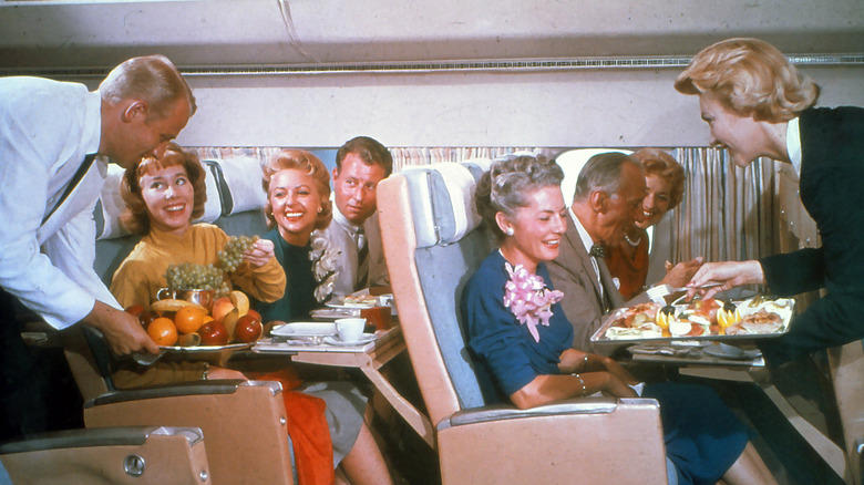 Air Union served the world's first full-course in-flight meal., Pan Am's first-class menu was catered by Maxim's Paris., Pan Am's economy-class meal was equally impressive., Air France served a distinctly stylish French dinner., Northwest Orent Airlines served their dinner with complimentary cigarettes., Pam Am's breakfast menu was simple but fresh., Trans World Airline offered international-themed flights., United served steak and lobster on domestic flights., Japan Airlines charged 25 cents for beer and sake., Pan Am served a full Christmas dinner in the 1980s.