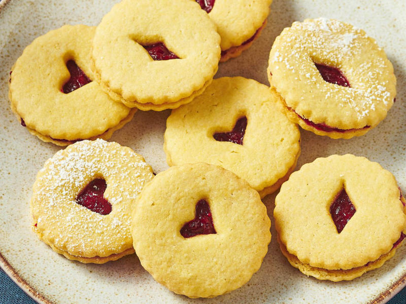 Easy Sugar Cookies, Cranberry Linzer Cookies, Peanut Butter Kiss Cookies, Pignoli Cookies, Maamoul (Lebanese Date Cookies), Mrs. Sigg's Snickerdoodles, Shortbread Cookies, Alfajores (Dulce de Leche Sandwich Cookies), Grandma's Gingersnap Cookies, The Best Rolled Sugar Cookies, Gingerbear Thumbprint Cookies, Grandma Minecci's Snowball Cookies, Ranger Cookie Bars, White Chocolate Cranberry Cookies, Pretzel Millionaire Bars, Biscotti, Orange Cranberry Ricotta Cookies, Buttercrunch Cookie Bars, Eggnog Thumbprints, Christmas Cornflake Wreath Cookies, Ricotta Cheese Cookies, Peppermint Holiday Cookies, Pfeffernüsse (German "Pepper-Nut" Christmas Cookies), Pizzelle, Best Gingerbread Men Cookies