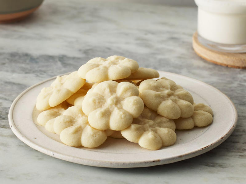 Easy Sugar Cookies, Cranberry Linzer Cookies, Peanut Butter Kiss Cookies, Pignoli Cookies, Maamoul (Lebanese Date Cookies), Mrs. Sigg's Snickerdoodles, Shortbread Cookies, Alfajores (Dulce de Leche Sandwich Cookies), Grandma's Gingersnap Cookies, The Best Rolled Sugar Cookies, Gingerbear Thumbprint Cookies, Grandma Minecci's Snowball Cookies, Ranger Cookie Bars, White Chocolate Cranberry Cookies, Pretzel Millionaire Bars, Biscotti, Orange Cranberry Ricotta Cookies, Buttercrunch Cookie Bars, Eggnog Thumbprints, Christmas Cornflake Wreath Cookies, Ricotta Cheese Cookies, Peppermint Holiday Cookies, Pfeffernüsse (German "Pepper-Nut" Christmas Cookies), Pizzelle, Best Gingerbread Men Cookies