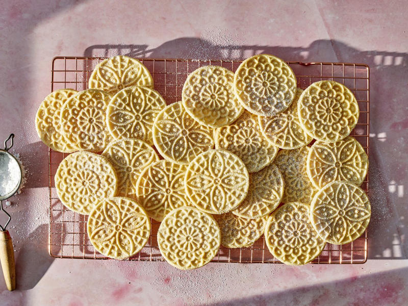 Easy Sugar Cookies, Cranberry Linzer Cookies, Peanut Butter Kiss Cookies, Pignoli Cookies, Maamoul (Lebanese Date Cookies), Mrs. Sigg's Snickerdoodles, Shortbread Cookies, Alfajores (Dulce de Leche Sandwich Cookies), Grandma's Gingersnap Cookies, The Best Rolled Sugar Cookies, Gingerbear Thumbprint Cookies, Grandma Minecci's Snowball Cookies, Ranger Cookie Bars, White Chocolate Cranberry Cookies, Pretzel Millionaire Bars, Biscotti, Orange Cranberry Ricotta Cookies, Buttercrunch Cookie Bars, Eggnog Thumbprints, Christmas Cornflake Wreath Cookies, Ricotta Cheese Cookies, Peppermint Holiday Cookies, Pfeffernüsse (German "Pepper-Nut" Christmas Cookies), Pizzelle, Best Gingerbread Men Cookies
