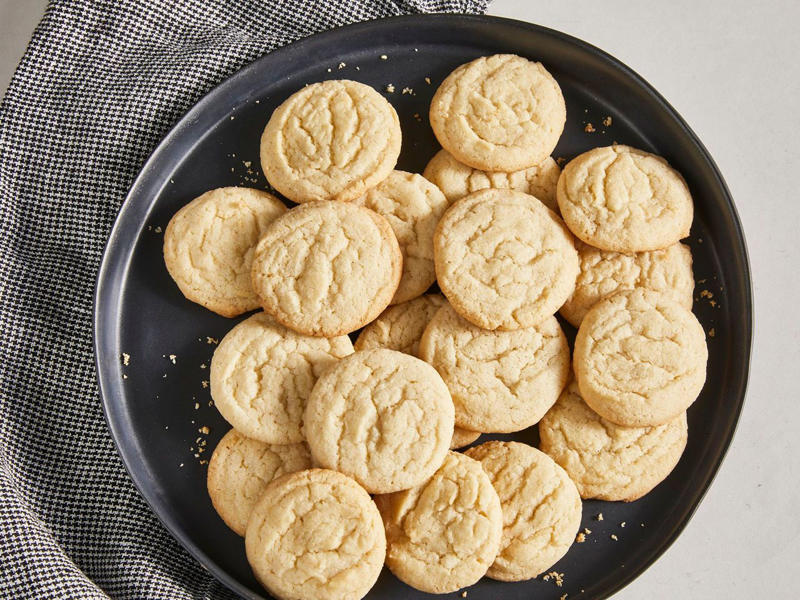 Easy Sugar Cookies, Cranberry Linzer Cookies, Peanut Butter Kiss Cookies, Pignoli Cookies, Maamoul (Lebanese Date Cookies), Mrs. Sigg's Snickerdoodles, Shortbread Cookies, Alfajores (Dulce de Leche Sandwich Cookies), Grandma's Gingersnap Cookies, The Best Rolled Sugar Cookies, Gingerbear Thumbprint Cookies, Grandma Minecci's Snowball Cookies, Ranger Cookie Bars, White Chocolate Cranberry Cookies, Pretzel Millionaire Bars, Biscotti, Orange Cranberry Ricotta Cookies, Buttercrunch Cookie Bars, Eggnog Thumbprints, Christmas Cornflake Wreath Cookies, Ricotta Cheese Cookies, Peppermint Holiday Cookies, Pfeffernüsse (German "Pepper-Nut" Christmas Cookies), Pizzelle, Best Gingerbread Men Cookies