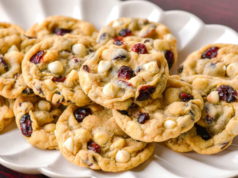 Easy Sugar Cookies, Cranberry Linzer Cookies, Peanut Butter Kiss Cookies, Pignoli Cookies, Maamoul (Lebanese Date Cookies), Mrs. Sigg's Snickerdoodles, Shortbread Cookies, Alfajores (Dulce de Leche Sandwich Cookies), Grandma's Gingersnap Cookies, The Best Rolled Sugar Cookies, Gingerbear Thumbprint Cookies, Grandma Minecci's Snowball Cookies, Ranger Cookie Bars, White Chocolate Cranberry Cookies, Pretzel Millionaire Bars, Biscotti, Orange Cranberry Ricotta Cookies, Buttercrunch Cookie Bars, Eggnog Thumbprints, Christmas Cornflake Wreath Cookies, Ricotta Cheese Cookies, Peppermint Holiday Cookies, Pfeffernüsse (German "Pepper-Nut" Christmas Cookies), Pizzelle, Best Gingerbread Men Cookies