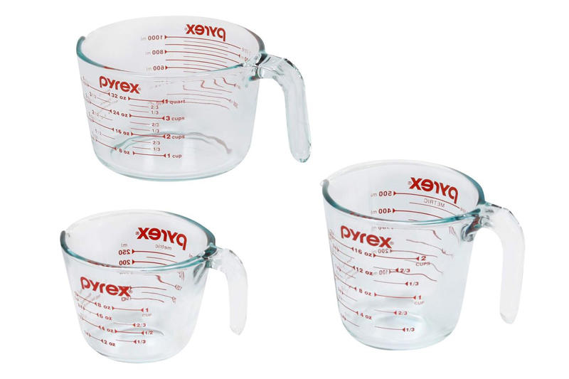 Best Non-Toxic Kitchen Swaps Overall, Butter Bell Ceramic Butter Crock, Ayiaren 12-Inch Teak Wood Spatula, Lane Linen 100% Cotton Kitchen Towels, Set of 12, Pyrex Essentials 3-Pack Glass Measuring Cups Set, De’Longhi 16.6-Ounce Thermal Glasses, Set of 2, Pyrex Simply Store Round Glass Food Storage Container, Le Creuset Stoneware 9-Inch Heritage Pie Dish, Tramontina Signature Tri-Ply Clad Stainless Steel 1.5-Quart Saucepan with Lid