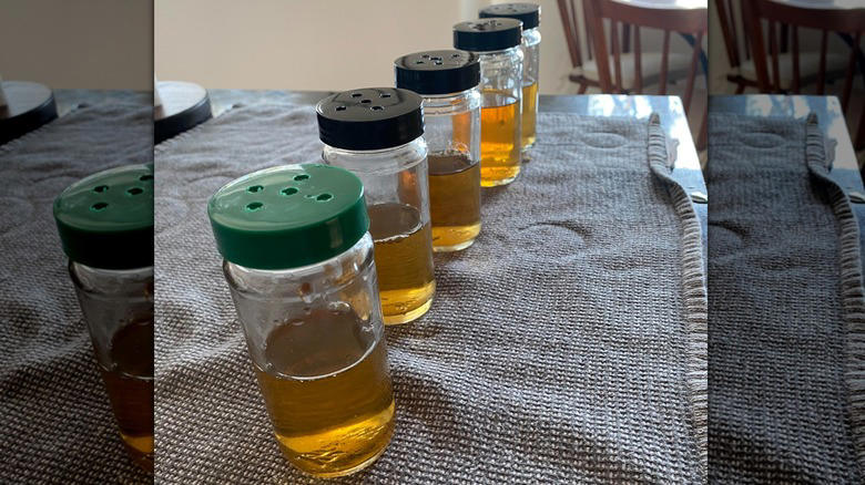 Plant propagators, Homemade sprinkle jars, Small vases, Terrariums, Office supply receptacles, Single-serve salad dressing containers, Art supply holders, Toothpick holders, Pill boxes, Proprietary spice blend jars, Toiletry holders, Travel kits, Fly traps, Spell bottles, Lunchbox parmesan shakers, Fairy houses