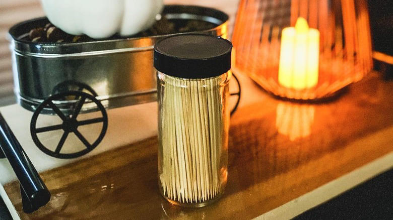 Plant propagators, Homemade sprinkle jars, Small vases, Terrariums, Office supply receptacles, Single-serve salad dressing containers, Art supply holders, Toothpick holders, Pill boxes, Proprietary spice blend jars, Toiletry holders, Travel kits, Fly traps, Spell bottles, Lunchbox parmesan shakers, Fairy houses