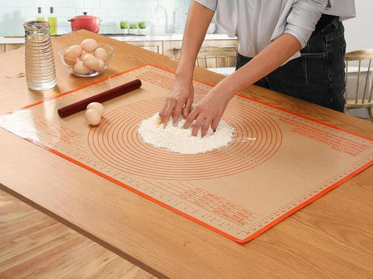 A bench scraper to keep their workspace tidy, A sous vide machine to cook proteins to perfection, A hosting gift for every palate, A KitchenAid stand mixer that puts in the elbow grease for you, A silicone baking mat to handle dough like a pro,  A magnetic meat thermometer for ultimate food safety and convenience, A giftable spice collection curated by chefs, An impressive set of Hedley &amp; Bennett knives , A Le Creuset pie dish too pretty to put away, A non-stick pan they’ll rely on for every meal, Related...