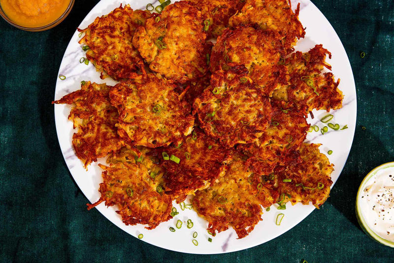 Best-Ever Potato Latkes, Potato Pancakes, Scallion Potato Pancakes, Latke Breakfast Hash, Savory Latke Babka, Killer Potato Latkes, Kate's Supercrispy Potato Latkes, Potato Pancakes with Smoked Salmon, Caviar, and Dill Cream, Scallops with Potato Pancakes and Caviar Sauce, Celery Root–Potato Pancakes with Green Apple Sour Cream, Crispy Summer Squash Pancakes