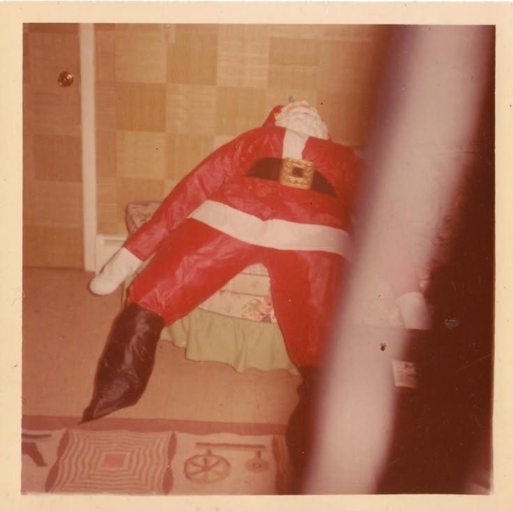 Santa Asleep on the Bed Weird Christmas Postcard, Girl Passed Out Under the Christmas Tree, Crying Kid on Santa’s Lap, Santa Writing “Merry Christmas” in Bathroom Graffiti, Santa Asleep on the Bed, Eating on the Floor With a Sad Christmas Tree, Santa Driving While Talking on the Phone, Santa Posing Like a Cool Kid, Sad Christmas Tree That’s Basically a Stick, Broom Used as a Christmas Tree, Santa Drinking Whisky at a Bar, Air Freshener Sticker Used as a Christmas Tree, Plunger Christmas Tree With Toilet Paper, Indoor Snowman Made of Toilet Paper, Christmas Tree Decorated With Toilet Paper Rolls