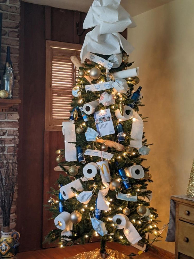 Christmas Tree Decorated With Toilet Paper Rolls Weird Christmas Postcard, Girl Passed Out Under the Christmas Tree, Crying Kid on Santa’s Lap, Santa Writing “Merry Christmas” in Bathroom Graffiti, Santa Asleep on the Bed, Eating on the Floor With a Sad Christmas Tree, Santa Driving While Talking on the Phone, Santa Posing Like a Cool Kid, Sad Christmas Tree That’s Basically a Stick, Broom Used as a Christmas Tree, Santa Drinking Whisky at a Bar, Air Freshener Sticker Used as a Christmas Tree, Plunger Christmas Tree With Toilet Paper, Indoor Snowman Made of Toilet Paper, Christmas Tree Decorated With Toilet Paper Rolls