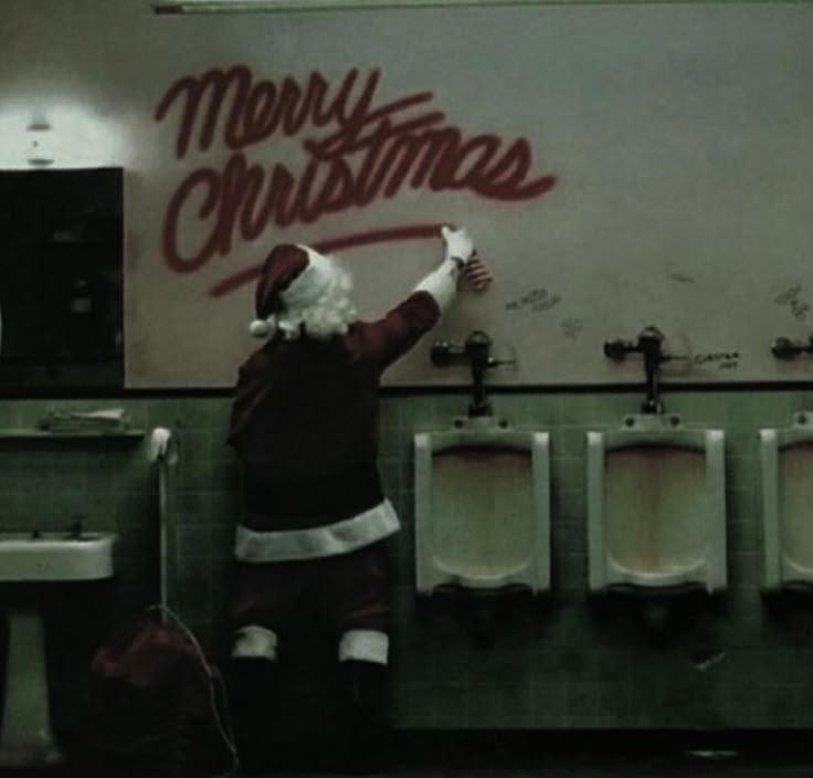 Santa Writing “Merry Christmas” in Bathroom Graffiti Weird Christmas Postcard, Girl Passed Out Under the Christmas Tree, Crying Kid on Santa’s Lap, Santa Writing “Merry Christmas” in Bathroom Graffiti, Santa Asleep on the Bed, Eating on the Floor With a Sad Christmas Tree, Santa Driving While Talking on the Phone, Santa Posing Like a Cool Kid, Sad Christmas Tree That’s Basically a Stick, Broom Used as a Christmas Tree, Santa Drinking Whisky at a Bar, Air Freshener Sticker Used as a Christmas Tree, Plunger Christmas Tree With Toilet Paper, Indoor Snowman Made of Toilet Paper, Christmas Tree Decorated With Toilet Paper Rolls