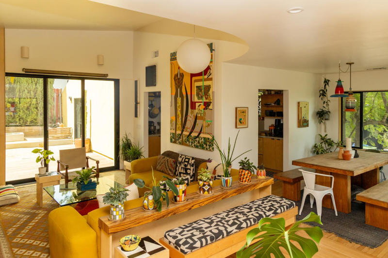 A colorful, sun-drenched kitchen in Mount Washington that connects to nature , In Hollywood, a stunning living room that's filled with second-hand furnishings, A modern West Hollywood living room decorated with pets in mind , A surprising Silver Lake kitchen that doubles as a retro video store , A treasures-filled living room in Eagle Rock that's a colorful showstopper, A ’70s-inspired speakeasy/lounge in Highland Park that's hidden behind a bookcase , In Reseda, an apartment where every antique tells a story
