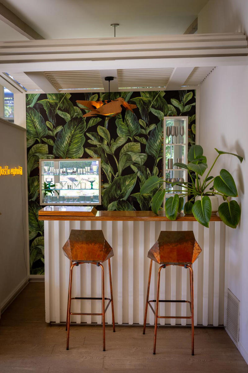 A colorful, sun-drenched kitchen in Mount Washington that connects to nature , In Hollywood, a stunning living room that's filled with second-hand furnishings, A modern West Hollywood living room decorated with pets in mind , A surprising Silver Lake kitchen that doubles as a retro video store , A treasures-filled living room in Eagle Rock that's a colorful showstopper, A ’70s-inspired speakeasy/lounge in Highland Park that's hidden behind a bookcase , In Reseda, an apartment where every antique tells a story