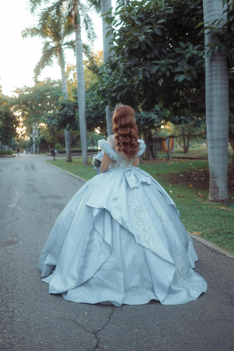 A flowing dress with sequins, A light A-line dress, A jersey dress, A fringed dress, A stretch cotton dress, A heavy satin mermaid dress, A ball gown with a petticoat, A strapless dress adorned with pearls, A tulle dress with a train, A form-fitting velvet dress