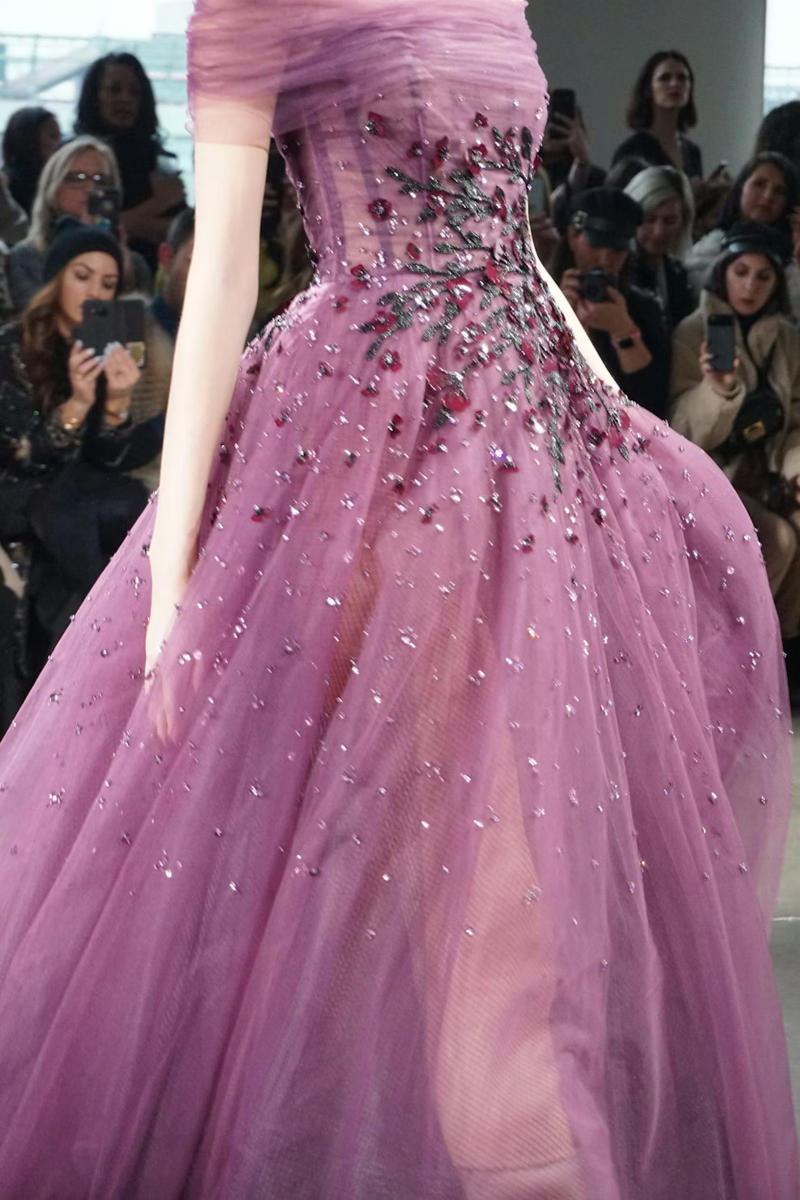 A flowing dress with sequins, A light A-line dress, A jersey dress, A fringed dress, A stretch cotton dress, A heavy satin mermaid dress, A ball gown with a petticoat, A strapless dress adorned with pearls, A tulle dress with a train, A form-fitting velvet dress