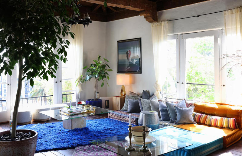 A colorful, sun-drenched kitchen in Mount Washington that connects to nature , In Hollywood, a stunning living room that's filled with second-hand furnishings, A modern West Hollywood living room decorated with pets in mind , A surprising Silver Lake kitchen that doubles as a retro video store , A treasures-filled living room in Eagle Rock that's a colorful showstopper, A ’70s-inspired speakeasy/lounge in Highland Park that's hidden behind a bookcase , In Reseda, an apartment where every antique tells a story