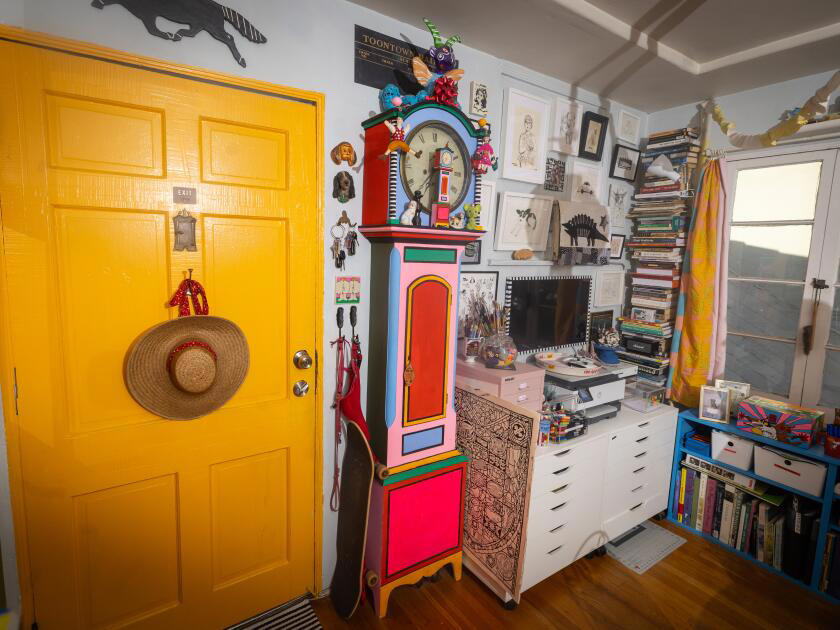 A colorful, sun-drenched kitchen in Mount Washington that connects to nature , In Hollywood, a stunning living room that's filled with second-hand furnishings, A modern West Hollywood living room decorated with pets in mind , A surprising Silver Lake kitchen that doubles as a retro video store , A treasures-filled living room in Eagle Rock that's a colorful showstopper, A ’70s-inspired speakeasy/lounge in Highland Park that's hidden behind a bookcase , In Reseda, an apartment where every antique tells a story
