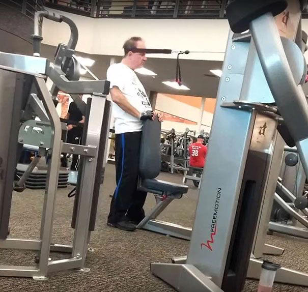 Reading the Newspaper on a Gym Machine, Man Using Gym Equipment Wrong, Guy Dressed Like Kill Bill at the Gym, Man Using an Exercise Ball in a Weird Way, Man Completely Confused by Gym Equipment, Man Reading the Newspaper, Old Lady Using Gym Machine Wrong, Guy Screaming While Exercising, Man Standing on Stacked Weights, Guy Bending Way Too Much While Lifting Weights, Woman Striking a Very Strange Pose, Weights on Her Back While on Her Phone, Woman Lying Down at the Gym Using Her Phone, Two-Wheel Scooter on a Treadmill, Woman Lying Down, Ignoring the Machine, Guy Carrying a Giant iPad on His Back, Full Cyclist Mode, Guy Eating at the Gym