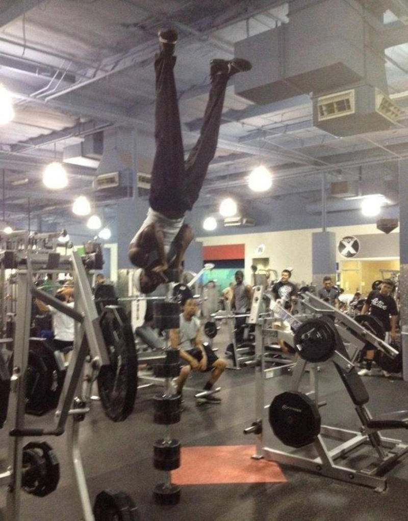 Reading the Newspaper on a Gym Machine, Man Using Gym Equipment Wrong, Guy Dressed Like Kill Bill at the Gym, Man Using an Exercise Ball in a Weird Way, Man Completely Confused by Gym Equipment, Man Reading the Newspaper, Old Lady Using Gym Machine Wrong, Guy Screaming While Exercising, Man Standing on Stacked Weights, Guy Bending Way Too Much While Lifting Weights, Woman Striking a Very Strange Pose, Weights on Her Back While on Her Phone, Woman Lying Down at the Gym Using Her Phone, Two-Wheel Scooter on a Treadmill, Woman Lying Down, Ignoring the Machine, Guy Carrying a Giant iPad on His Back, Full Cyclist Mode, Guy Eating at the Gym