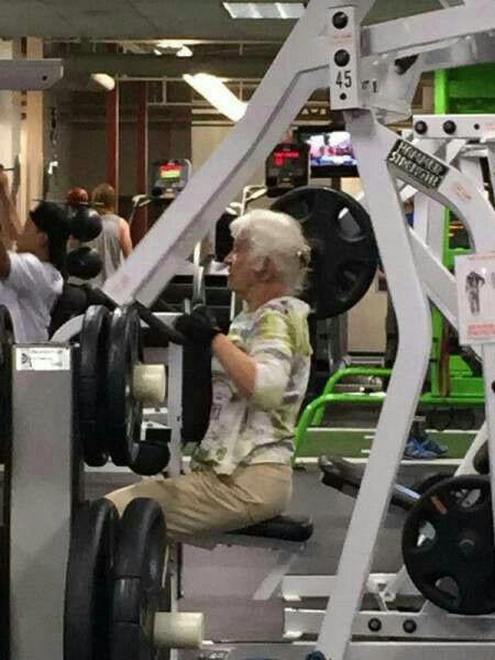 Reading the Newspaper on a Gym Machine, Man Using Gym Equipment Wrong, Guy Dressed Like Kill Bill at the Gym, Man Using an Exercise Ball in a Weird Way, Man Completely Confused by Gym Equipment, Man Reading the Newspaper, Old Lady Using Gym Machine Wrong, Guy Screaming While Exercising, Man Standing on Stacked Weights, Guy Bending Way Too Much While Lifting Weights, Woman Striking a Very Strange Pose, Weights on Her Back While on Her Phone, Woman Lying Down at the Gym Using Her Phone, Two-Wheel Scooter on a Treadmill, Woman Lying Down, Ignoring the Machine, Guy Carrying a Giant iPad on His Back, Full Cyclist Mode, Guy Eating at the Gym