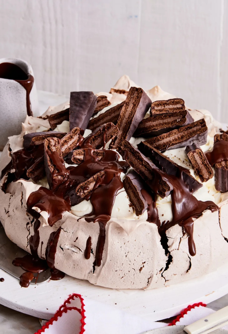 16 of our most beloved Christmas desserts, Nan’s fruit trifle , Date and ginger Christmas cake , Golden syrup steamed pudding , Pavlova with summer berries , Homemade nougat squares , Healthy pumpkin fruit cake , Italian-inspired trifle , Pavlova with honey-roasted rhubarb, raspberries and yoghurt cream , Sago plum pudding , Christmas fruit cake , Grandma’s Christmas cake , Cardamom sugar cookies , A grandmother’s traditional Christmas pudding , Gluten free tiramisu , Arnott’s dark Tim Tam pavlova