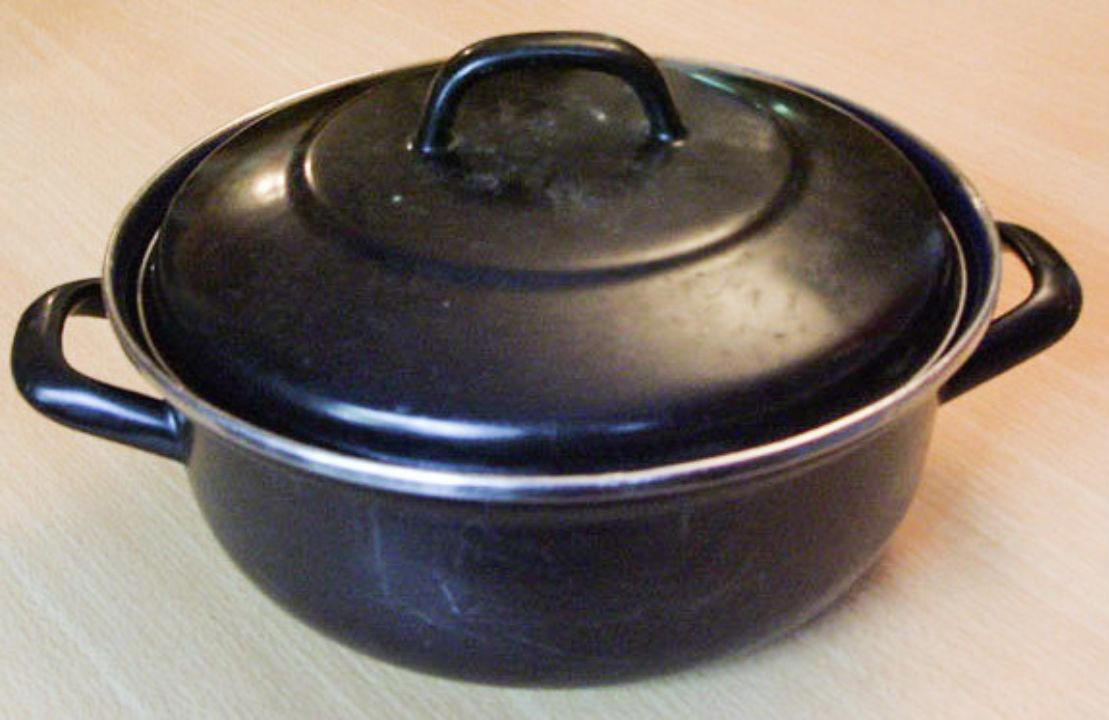 Colorful Enamel Stockpots And Dutch Ovens 7 Vintage Kitchen Items from Grandma’s House Now Worth a Fortune, Jadeite Mixing Bowls And Dinnerware, Patterned Pyrex Nesting Bowls, Midcentury Cast Iron Skillets, Colorful Enamel Stockpots And Dutch Ovens, Retro Stand Mixers In Pastel Shades, Novelty Cookie Jars With Character, Metal Bread Boxes And Canister Sets