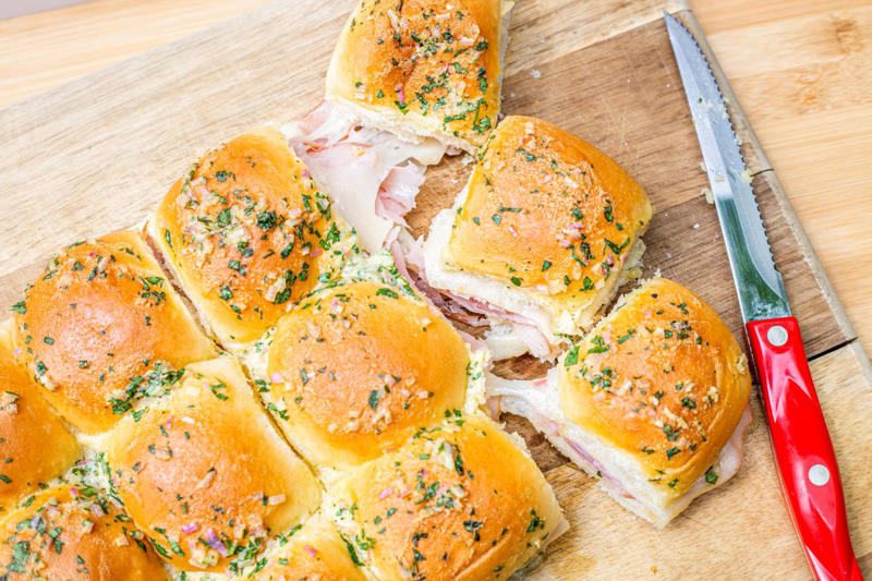 Pea Pesto, Hot Ham and Cheese Sliders, Whipped Feta with Figs, Pistachio, and Honey, Prosciutto and Cheese Puff Pastry Pinwheels, Classic Cheese Ball, Shrimp Cocktail, Creamy Zucchini Dip, Deviled Eggs with Horseradish and Dill, Mini Salmon Quiches, Honey Chorizo Dip, Slow Cooker Glazed Cocktail Meatballs, Easy Baked Brie in Puff Pastry, Smoked Salmon Crostini, Mediterranean Mezze Platter, Classic Stuffed Mushrooms, Million Dollar Deviled Eggs