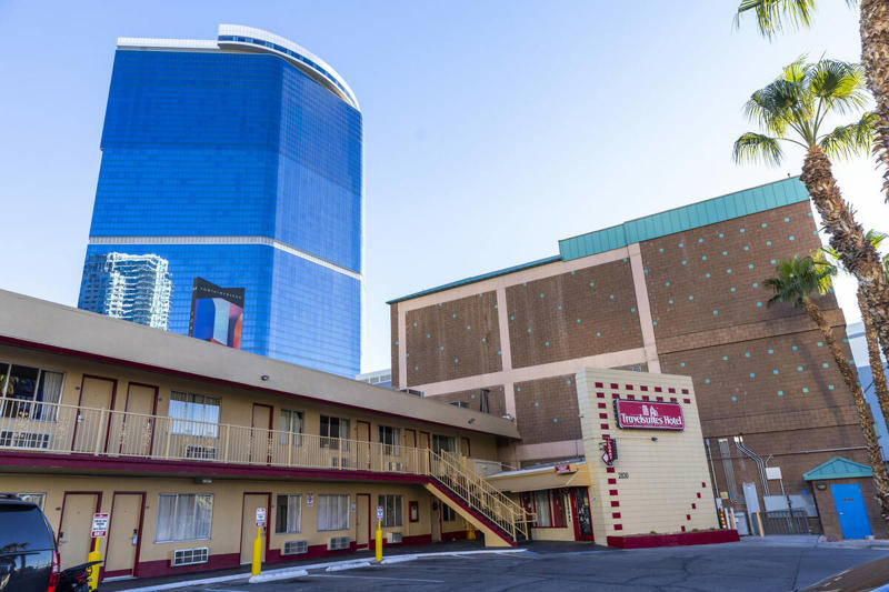 North Strip motel, Catholic church, Silver City Casino sign, Apartments behind Treasure Island, Jockey Club